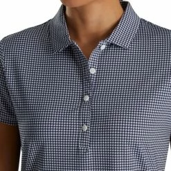 FootJoy Shortsleeve Essential Golf Polo 2022 Women 8 FootJoy Shortsleeve Essential Golf Polo 2022 Women -TravisMathew Shop ann3187 navy houndstooth 3 55294.1660095140